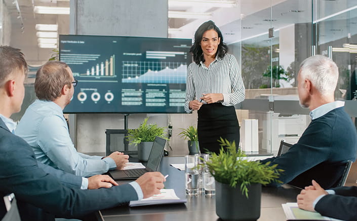 woman presenting at a meeting